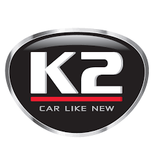 K2-logo med teksten «Car Like New» i hvitt og rødt på svart, oval bakgrunn med sølvkant.
